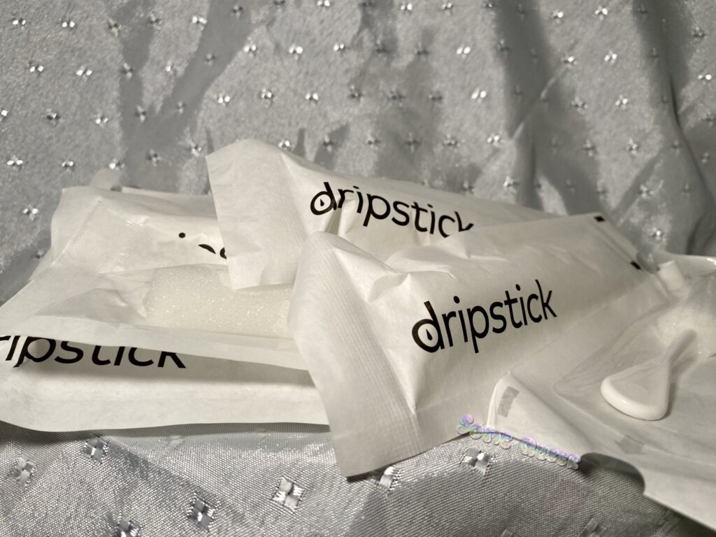 Pile of Awkward Essentials Dripsticks in sterile packages