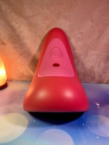 The Rider Desire posed backwards, so the clit tapper can be seen clearly.